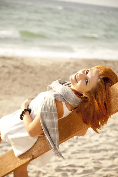 Young red-haired girl at wood near sea. — Stock Photo, Image