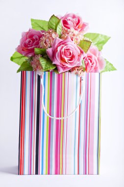 Presnt box with flowers inside. clipart