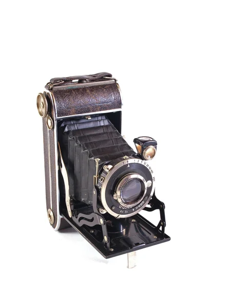 Old camera on a white background. Stock Image