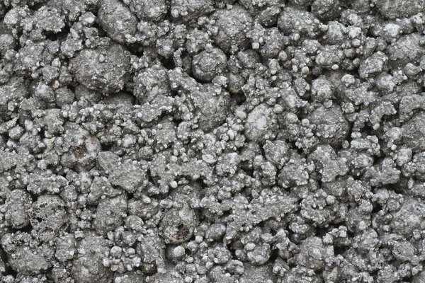 Grijze hobbelige concrete textuur — Stockfoto