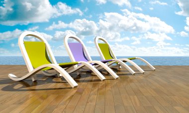 Deckchairs in front of sea clipart