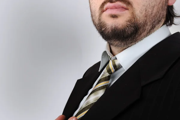 Empresário colocar na gravata — Fotografia de Stock