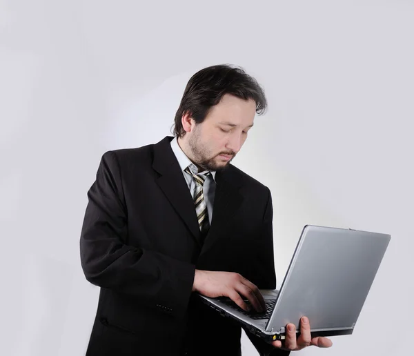 Hombre de negocios usando portátil — Foto de Stock