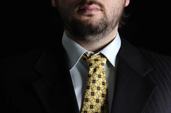 Business man portrait on black background — Stock Photo, Image
