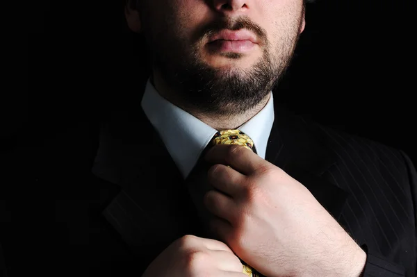 Businessman put on the tie — Stock Photo, Image