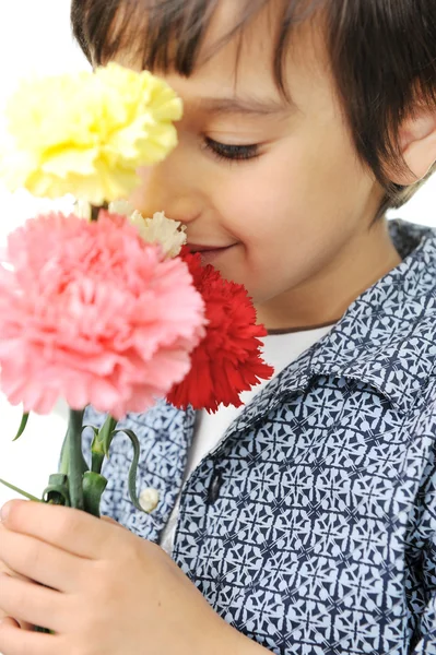 The happy boy with a bouquet of tulips — Stock Photo, Image