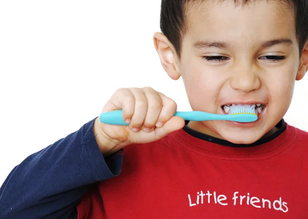 Garçon nettoie les dents — Photo
