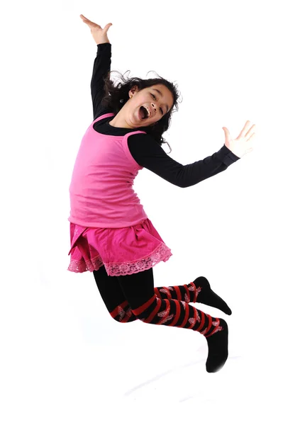 Roztomilé dítě skákat přes bílé pozadí愛らしい子供以上ジャンプ ホワイト バック グラウンド — Stock fotografie