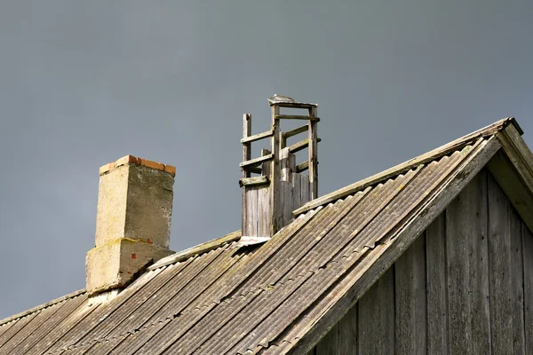 stock image Renovated and the old chimneys