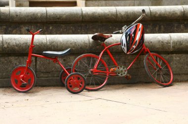 Two red retro bicycles clipart