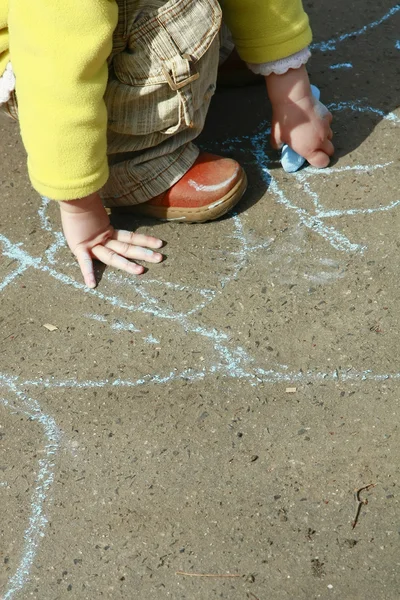 stock image DRAWING LITTLE GIRL WITH A CHALK