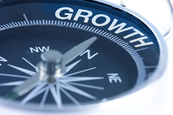 Growth word on compass — Stock Photo, Image