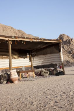 Bedouin tent in the egyptian dessert clipart