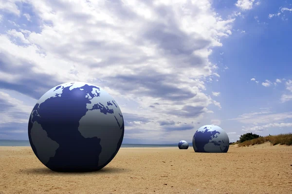 3D-aarde op het strand — Stockfoto