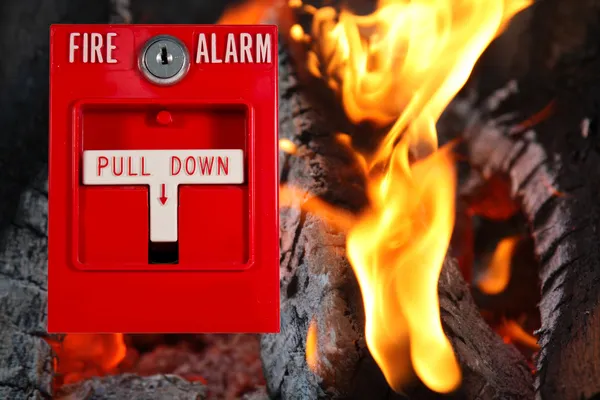 Alarme de incêndio com fundo de fogo — Fotografia de Stock