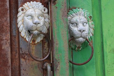 Antique lion head door knob clipart