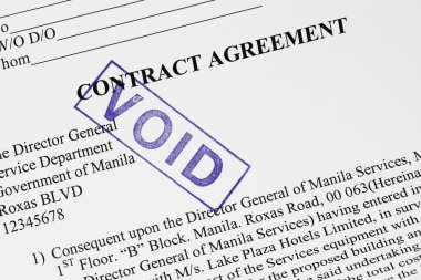 Void stamp on a contract agreement. clipart