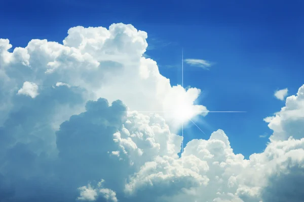 Sunrays in a white clouds — Stock Photo, Image