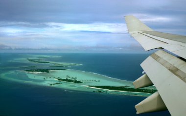 Over Maldivian islands clipart