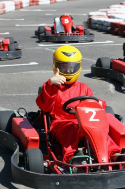 Smiling young racer clipart