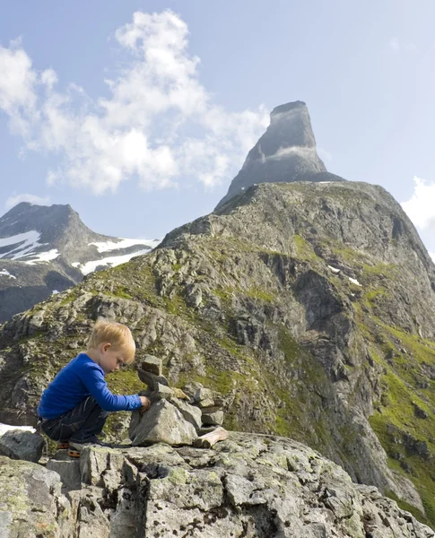 stock image Child building a cairn