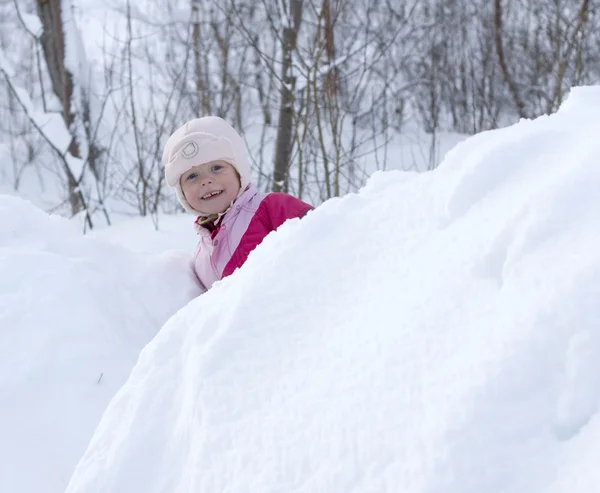 Child playing in the snow — Stock Photo, Image