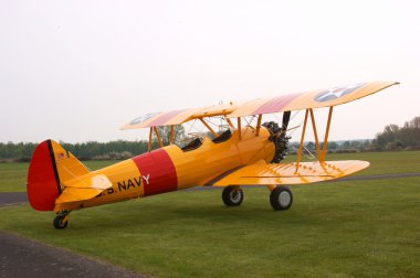 Yellow stearman biplane clipart