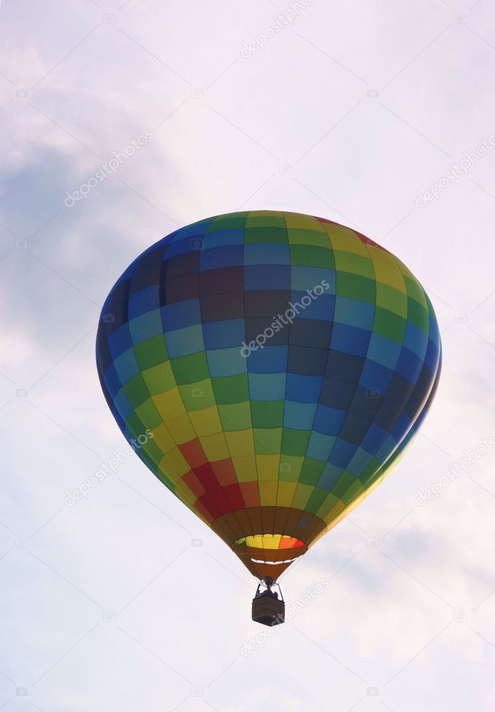 against background colorful hot air balloon going airborne gas