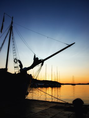 Port in the sunset clipart