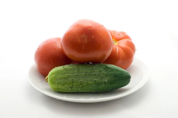 Pomidory i ogórek — Zdjęcie stockowe