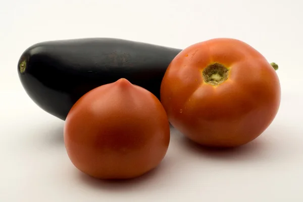 Tomatoes and eggplant — Stock Photo, Image