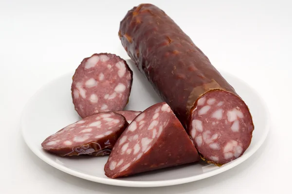 Sausage on a plate — Stock Photo, Image