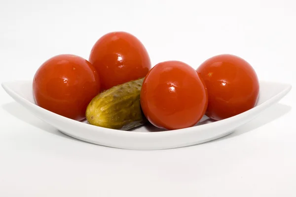 Homemade salted tomatoes and cucumber — Stock Photo, Image