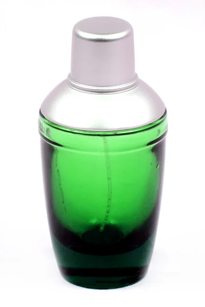 Frasco de perfume verde — Fotografia de Stock