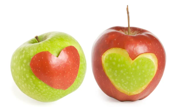Два яблока с сердцем — стоковое фото