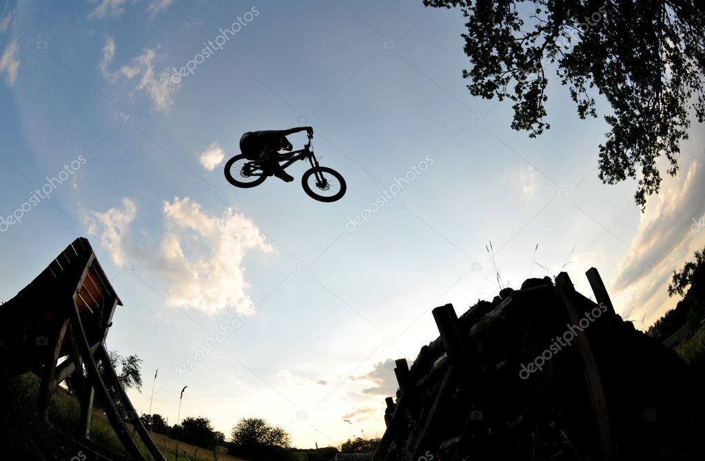 Extreme mountain bike jump — Stock Photo © taboga #3479723