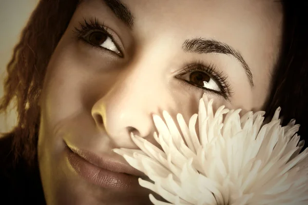 Girl with a white flower — Stock Photo, Image
