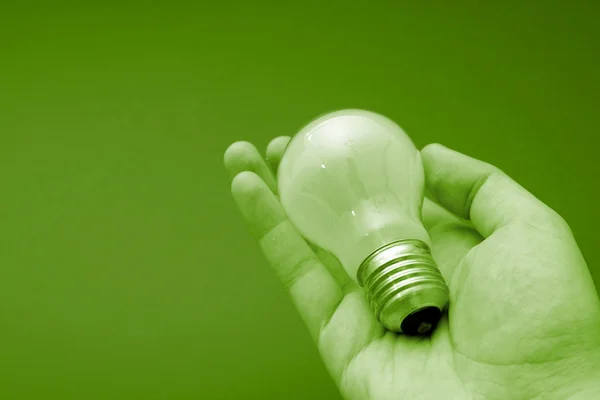 Bulb in a man hand — Stock Photo, Image