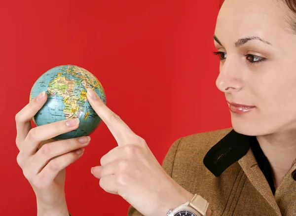 Globe in a girl's hands — Stock Photo, Image