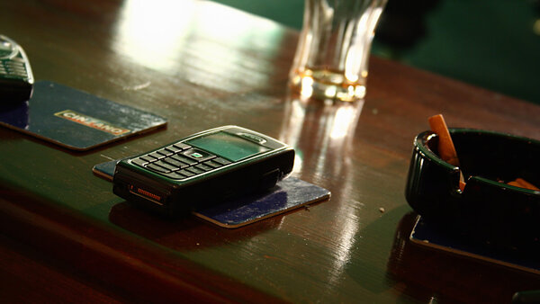 Cell phone on a desk in Club
