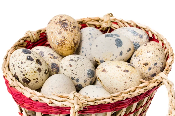 Stock image Quail eggs in a straw basket