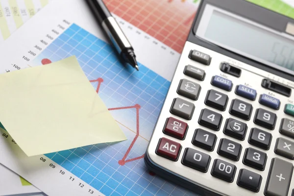 Kalkulator i schemat, seria finansów — Zdjęcie stockowe