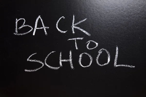 Inscrição em um quadro-negro escolar, de volta à escola — Fotografia de Stock