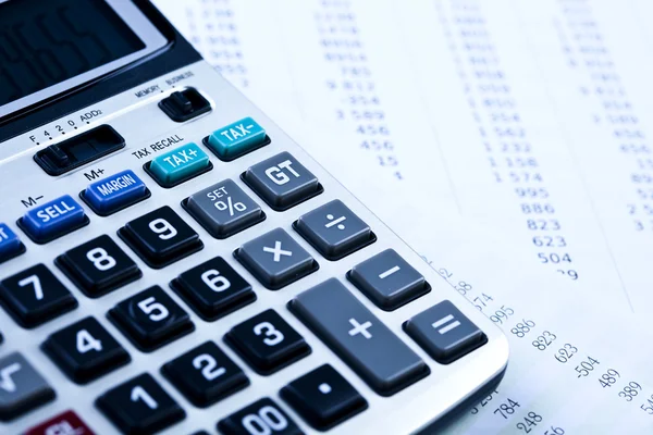 Calculator and diagram Royalty Free Stock Images