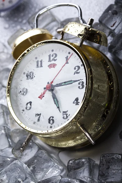 Tid, is og klokke – stockfoto