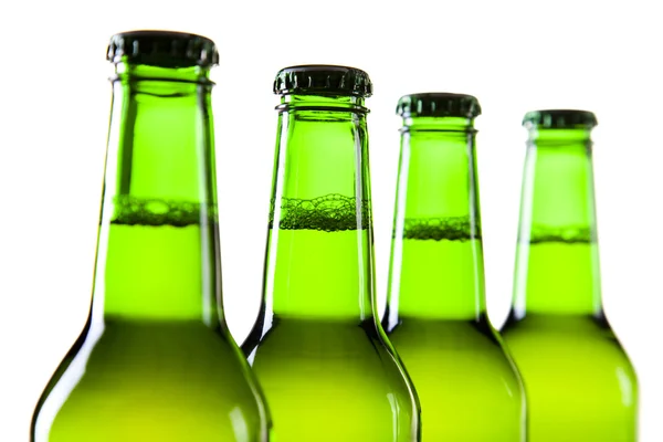 Botellas de cerveza sobre fondo blanco —  Fotos de Stock