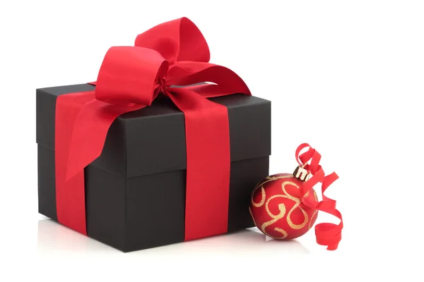 Christmas Present and Red Bauble — Stock Photo, Image