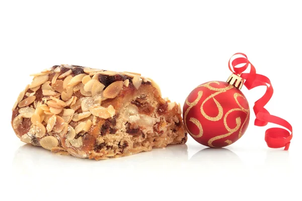 Stollen Cake and Christmas Bauble — Stock Photo, Image