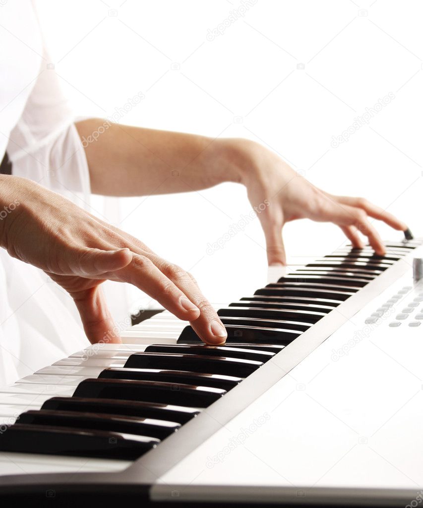 Playing piano — Stock Photo © Karuka #3087908