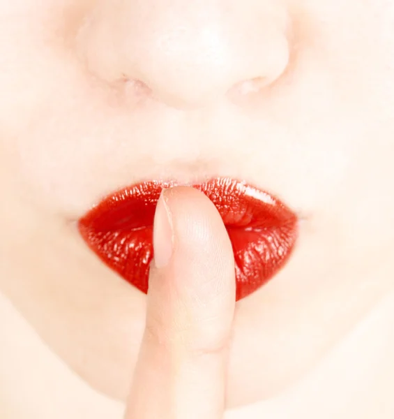 Finger på läppar — Stockfoto
